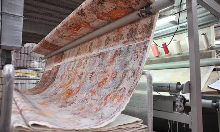 Woven carpet coming off the machine at full width